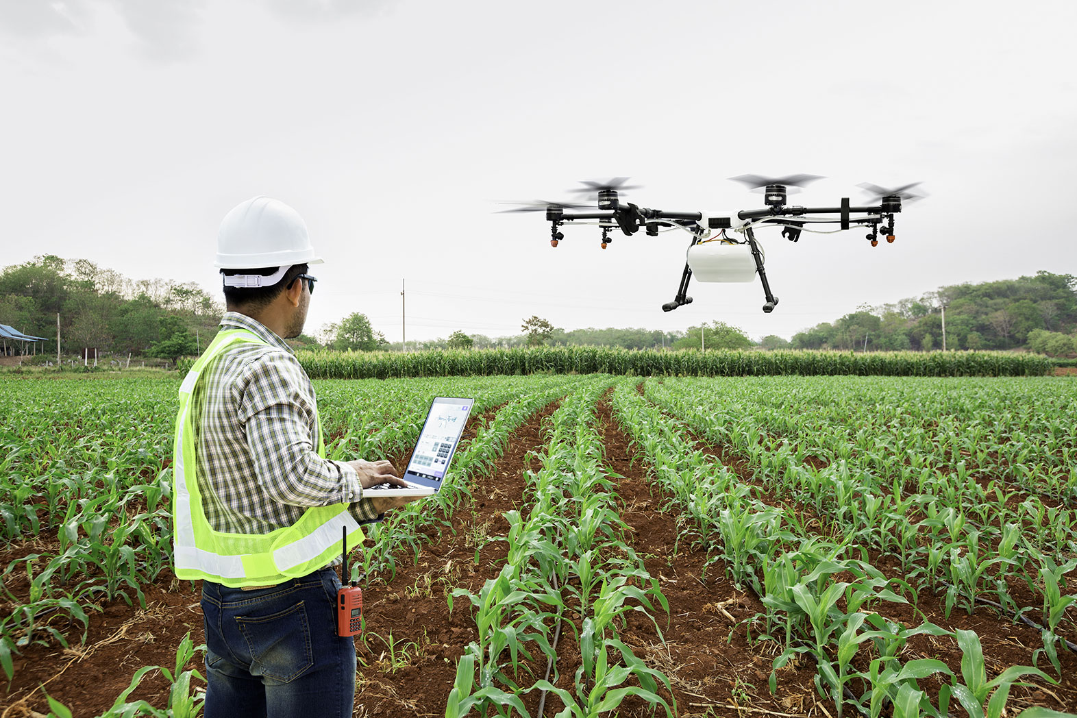 Farmer with drone, courtesy of Adobe Stock