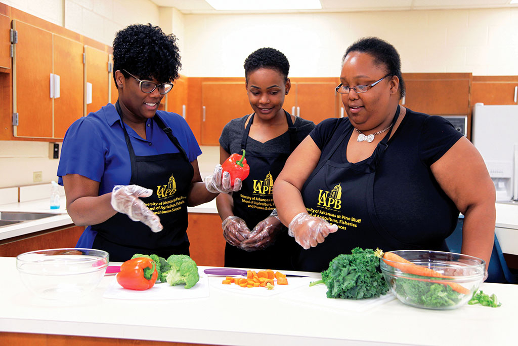 EFNEP. Image of women in kitchen courtesy of University of Arkansas at Pine Bluff.