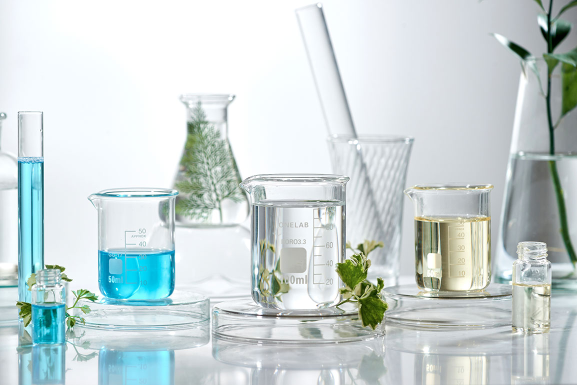 Image of beakers in lab courtesy of AdobeStock