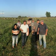 A group of Latino farmers learning grass management practices at a Southwest Missouri Ranch. Photo courtesy of Lincoln University Cooperative Extension.